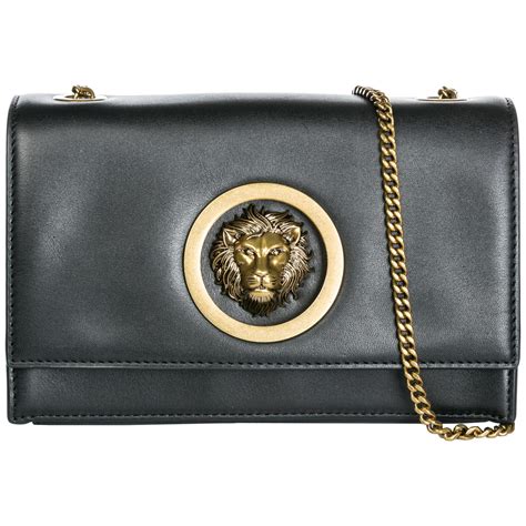 versace versus white crystal lion handbag|26 Best Designer Bags of 2024, According to ELLE Editors.